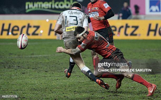 Oyonnax's French centre Pierre Aguillon vies with Paris' centre Geoffrey Doumayrou during the French Top 14 rugby match between Stade Francais and...