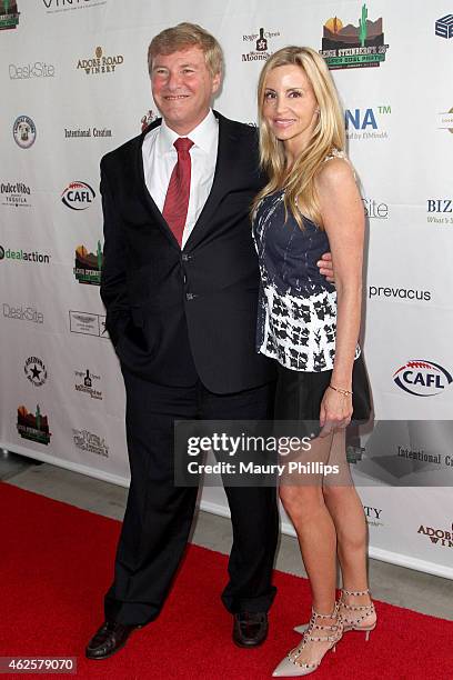 Host Leigh Steinberg and TV personality Camille Grammer attend the 28th Annual Leigh Steinberg Super Bowl Party at Arizona Science Center on January...