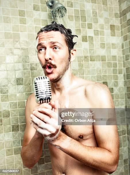 man singing in the shower - singing shower stock pictures, royalty-free photos & images