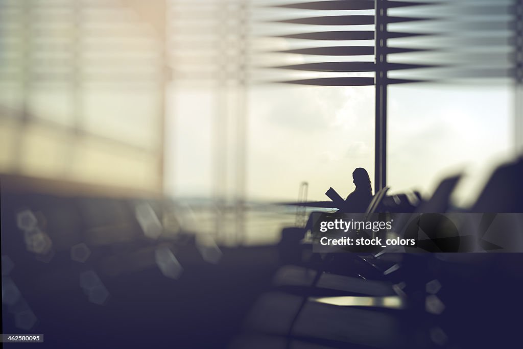 Waiting for her flight