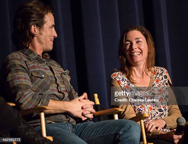 Actors Dermot Mulroney and Julianne Nicholson speak at the "August: Osage County" SAG Awards special screening at Harmony Gold Theatre on January 13,...