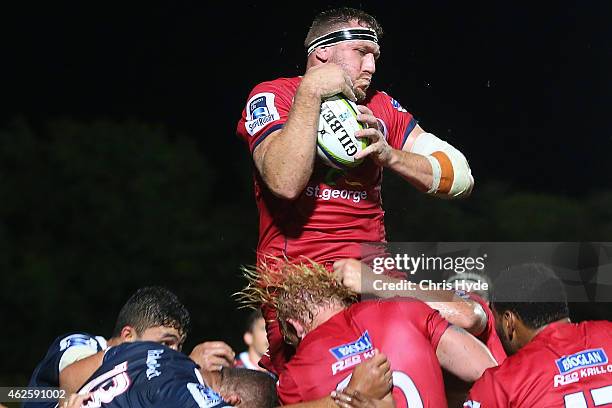 Marco Kotze of the Reds takes a lineout during the Super Rugby trial match between the Queensland Reds and the Melbourne Rebels at Barlow Park on...