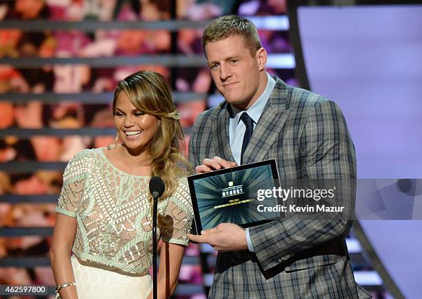 Model Chrissy Teigen and NFL player J.J. Watt speak onstage during 4th Annual NFL Honors at Phoenix Convention Center on January 31, 2015 in Phoenix,...