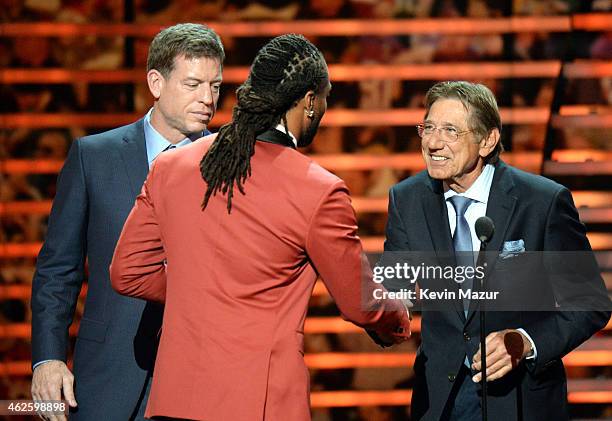 Retired NFL player Troy Aikman, NFL player Larry Fitzgerald, and retired NFL player Joe Namath speak onstage during 4th Annual NFL Honors at Phoenix...