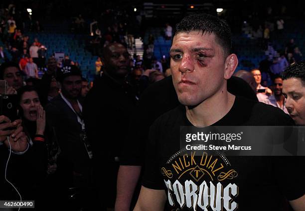 Nick Diaz leaves the arena after losing to Anderson Silva in a middleweight bout during UFC 183 at the MGM Grand Garden Arena on January 31, 2015 in...