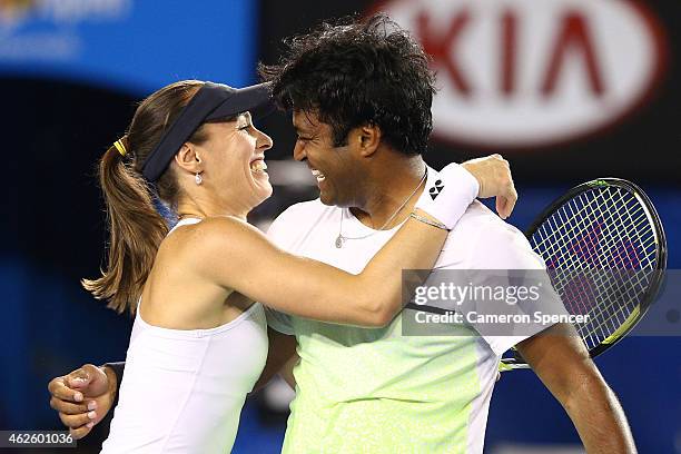 Martina Hingis of Switzerland and Leander Paes of India celebrate winning their final mixed doubles match against Kristina Mladenovic of France and...