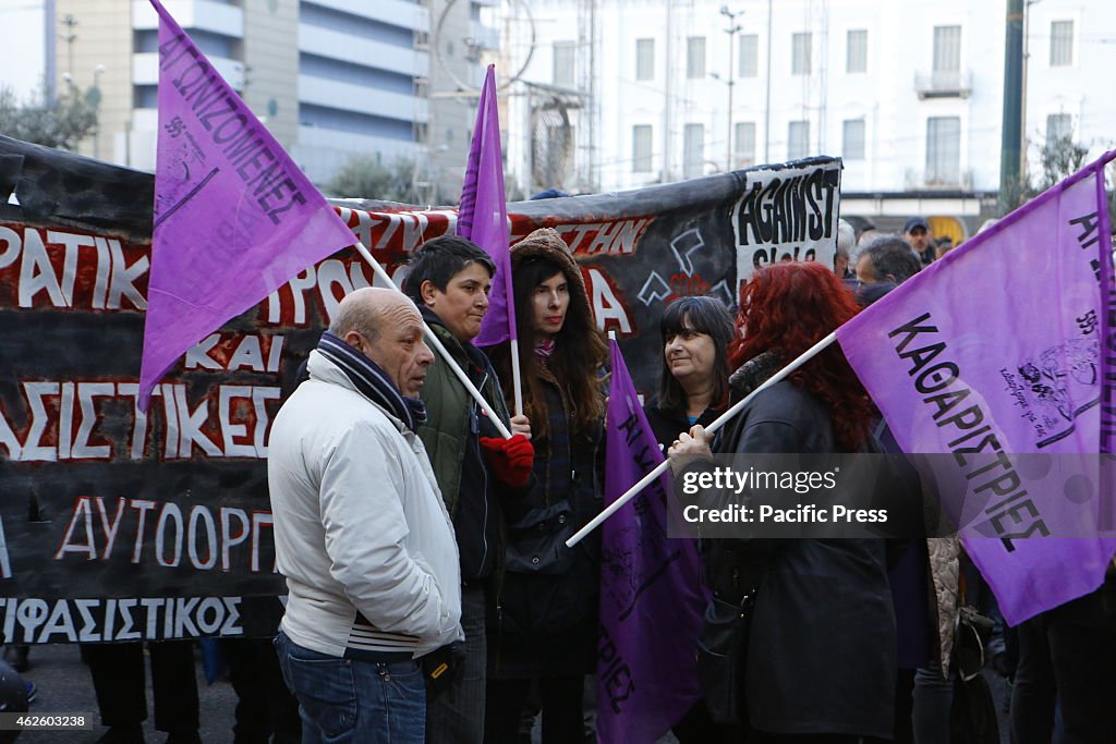 Women from the laid-off cleaners protest attend the rally.