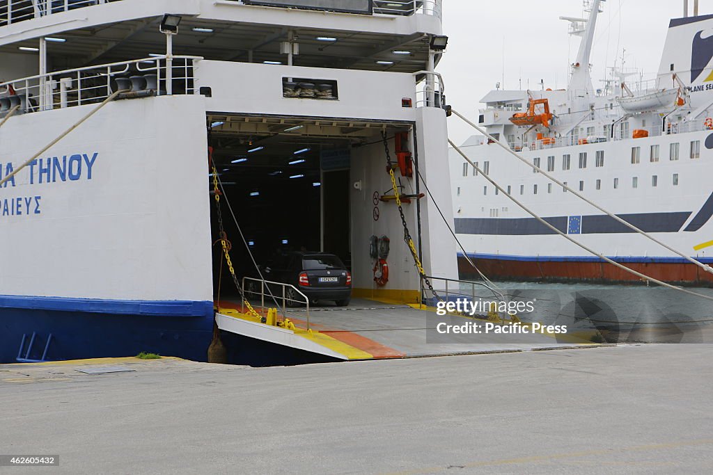 A car drives onto the M/F Temis ferry. The Hellenic...