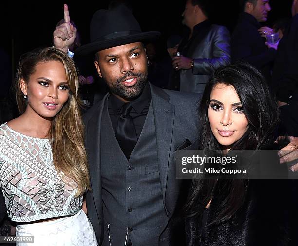 Model Chrissy Teigen, TV personality A.J. Calloway, and TV personality Kim Kardashian attend DirecTV Super Saturday Night hosted by Mark Cuban's AXS...