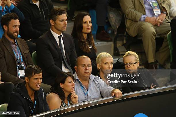 Actress Toni Collette and Actor Eric Bana watch the action at Rod Laver Arena during day 14 of the 2015 Australian Open at Melbourne Park on February...