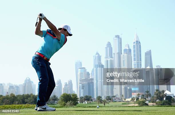 Rory McIlroy of Northern Ireland tees off on the eighth hole during the final round of the Omega Dubai Desert Classic on the Majlis Course at the...