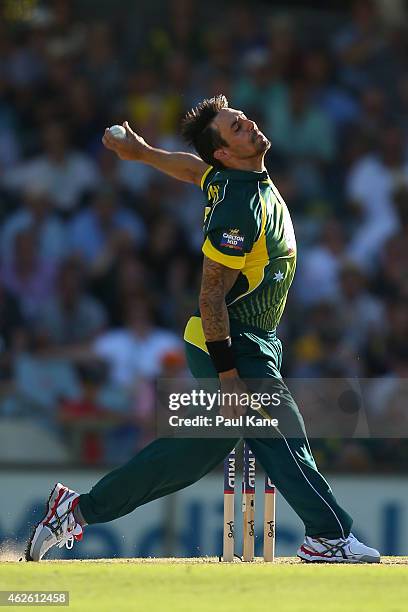 Mitchell Johnson of Australia bowls during the final match of the Carlton Mid One Day International series between Australia and England at WACA on...