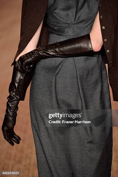 Model walks the runway at Lena Hoschek show during Mercedes-Benz Fashion Week Autumn/Winter 2014/15 at Brandenburg Gate on January 14, 2014 in...