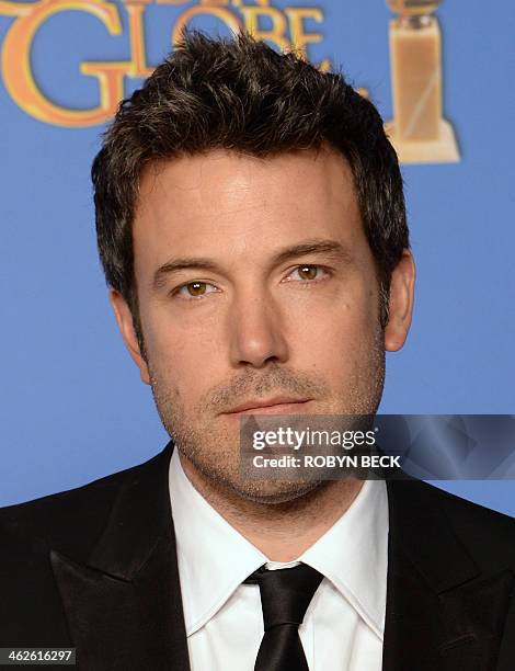 Director Ben Affleck poses in the press room during the 71st Annual Golden Globe Awards in Beverly Hills, California, January 12, 2014. AFP PHOTO /...