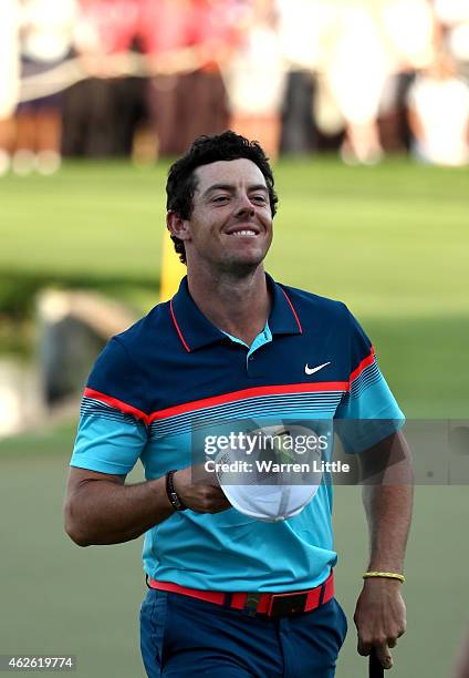 Rory McIlroy of Northern Ireland celebrates winning the Omega Dubai Desert Classic on the Majlis Course at the Emirates Golf Club on February 1, 2015...