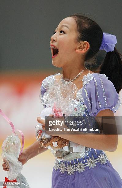 Mao Asada celebrates after finishing the performance with successful three consecutive triples during her Ladies Singles free program at the All...