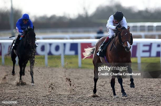 Jamie Spencer rides Thanksgiving Day to win The Bet on UK Racing with tote pool Handicap stakes at Chelmsford City racecourse on February 01, 2015 in...