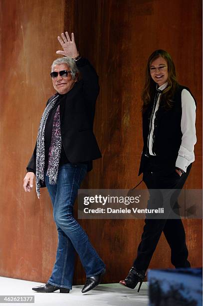 Designer Roberto Cavalli and Eva Cavalli acknowledges the applause of the public after the Roberto Cavalli show as a part of Milan Fashion Week...