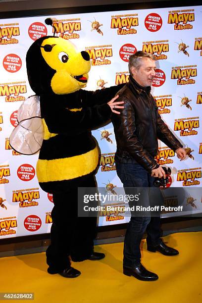 Host Christophe Beaugrand and actor Antoine de Caunes attend the 'Maya The Bee - La Grande Aventure De Maya L'Abeille' Paris Premiere at UGC Cine...