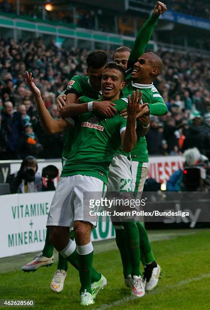 Franco di Santo of Bremen celebrates with his team mates after scoring his team's first goal during the Bundesliga match between Werder Bremen and...