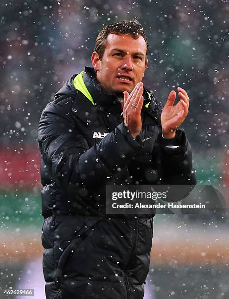 Head coach Markus Weinzierl of Augsburg celebrates after the Bundesliga match between FC Augsburg and 1899 Hoffenheim at SGL Arena on February 1,...