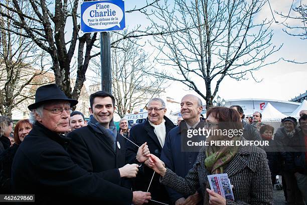 Mayor of Bordeaux Alain Juppe , Mayor of Angouleme Xavier Bonnefont and President of the Association of the Comics Festival Patrick Ausou attend a...