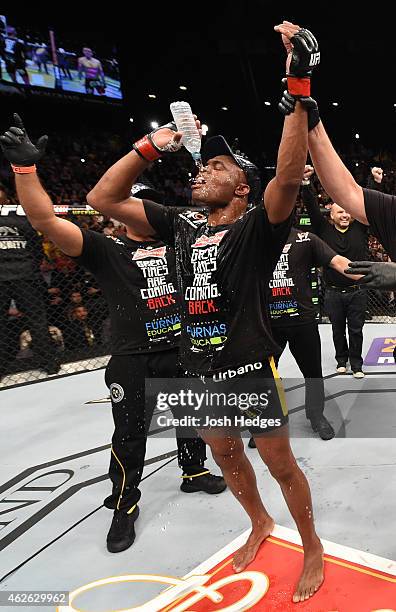 Anderson Silva of Brazil celebrates after his unanimous-decision victory over Nick Diaz in their middleweight fight during the UFC 183 event at the...