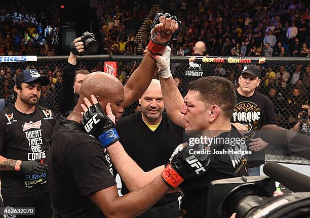 Nick Diaz congratulates Anderson Silva of Brazil after Silva defeated Diaz by unanimous decision in their middleweight bout during the UFC 183 event...