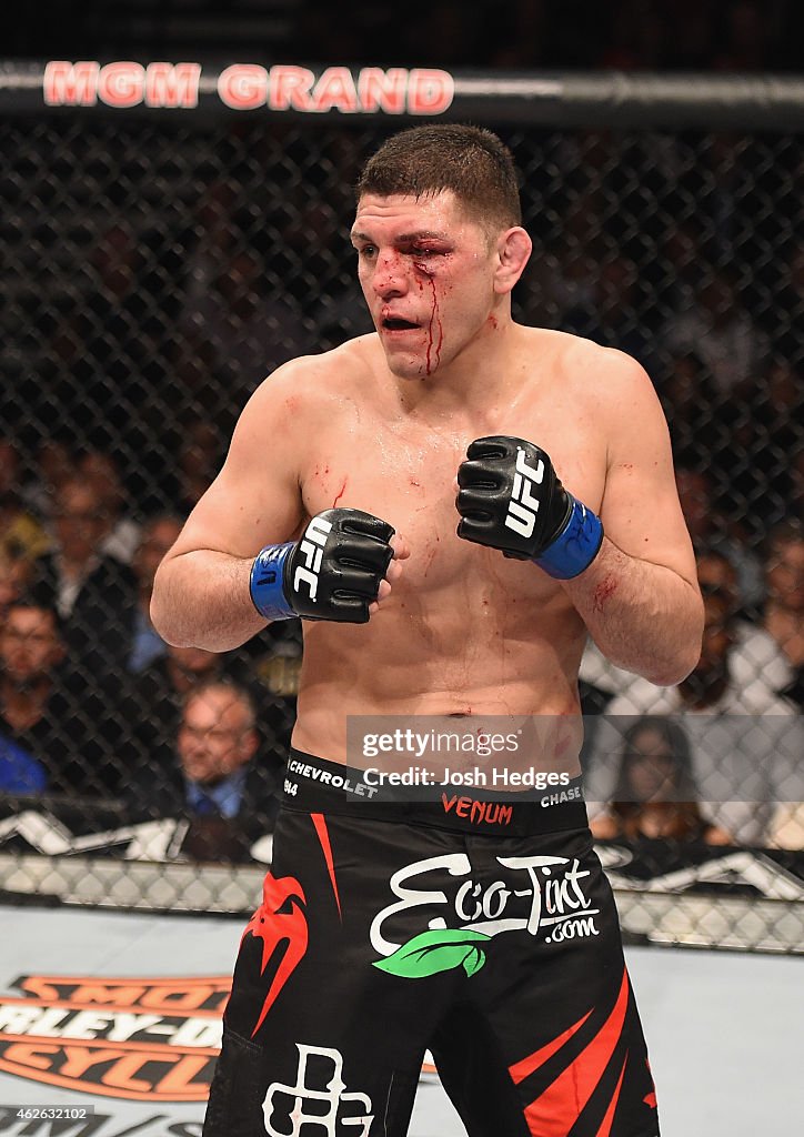 Nick Diaz battles Anderson Silva in their middleweight bout during