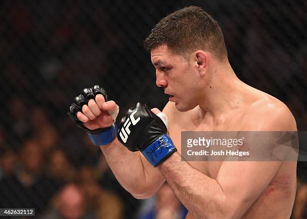 Nick Diaz battles Anderson Silva in their middleweight bout during the UFC 183 event at the MGM Grand Garden Arena on January 31, 2015 in Las Vegas,...