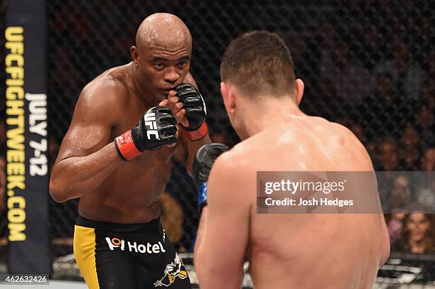 Anderson Silva of Brazil battles Nick Diaz in their middleweight bout during the UFC 183 event at the MGM Grand Garden Arena on January 31, 2015 in...