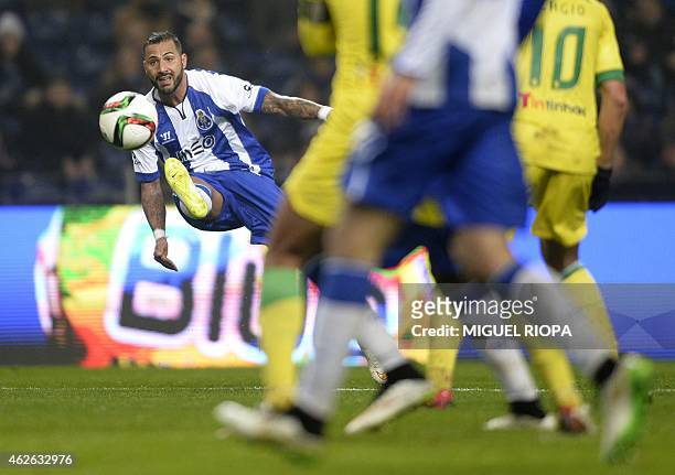 Porto's forward and captain Ricardo Quaresma kicks the ball to score his second goal during the Portuguese league football match FC Porto v FC Pacos...