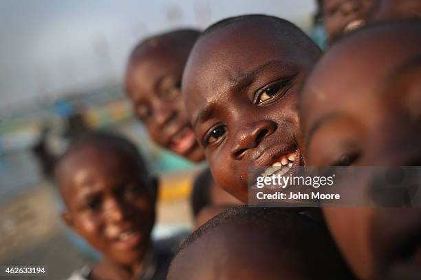 Children play in the West Point township on February 1, 2015 in Monrovia, Liberia. Life has begun to slowly return to normal for many Liberians, as...