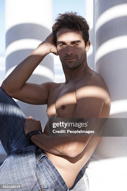 getting some shade on a warm summer's day - touching hair stock pictures, royalty-free photos & images