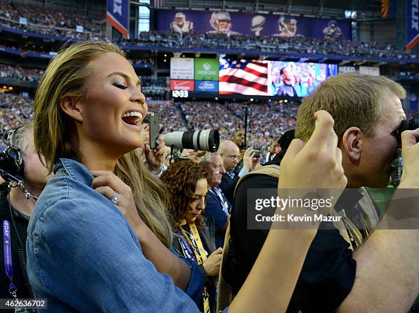 Model Chrissy Teigen attends Super Bowl XLIX at University of Phoenix Stadium on February 1, 2015 in Glendale, Arizona.