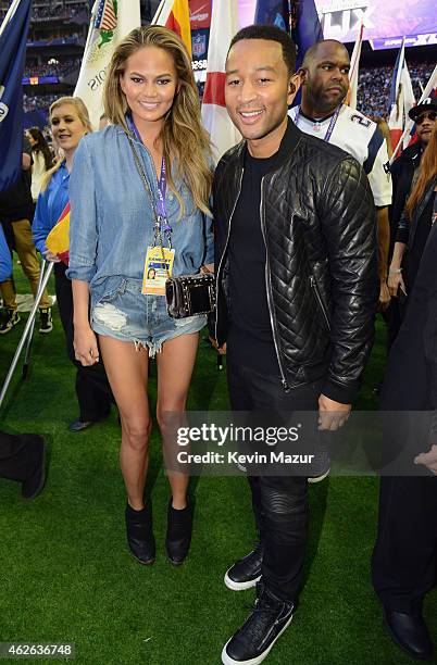 Model Chrissy Teigen and musician John Legend attend Super Bowl XLIX at University of Phoenix Stadium on February 1, 2015 in Glendale, Arizona.