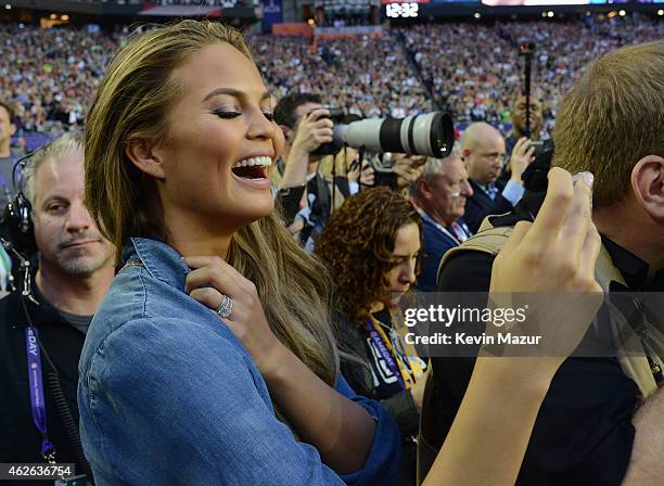 Model Chrissy Teigen attends Super Bowl XLIX at University of Phoenix Stadium on February 1, 2015 in Glendale, Arizona.