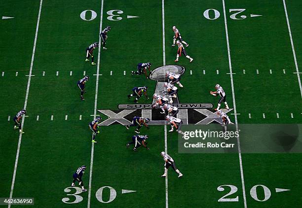 The Seattle Seahawks play the New England Patriots in the first quarter during Super Bowl XLIX at University of Phoenix Stadium on February 1, 2015...