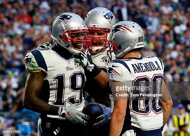 Brandon LaFell celebrates after a touchdown with Danny Amendola of the New England Patriots against the Seattle Seahawks in the second quarter during...