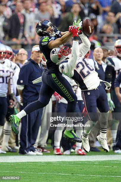 Logan Ryan of the New England Patriots defends a pass intended for Jermaine Kearse of the Seattle Seahawks in the second quarter during Super Bowl...