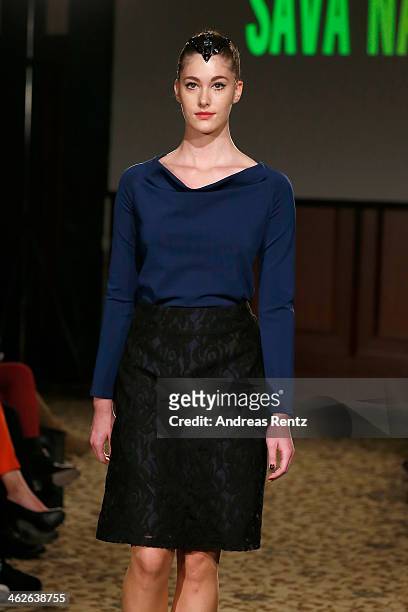 Model walks the runway at the Sava Nald show during the Mercedes-Benz Fashion Week Autumn/Winter 2014/15 at Hotel Adlon on January 14, 2014 in...
