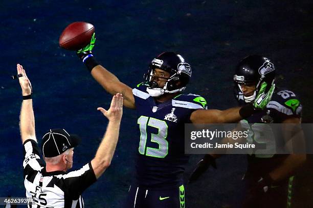 Chris Matthews of the Seattle Seahawks celebrates scoring an 11 yard touchdown late in the second quarter with Doug Baldwin against the New England...