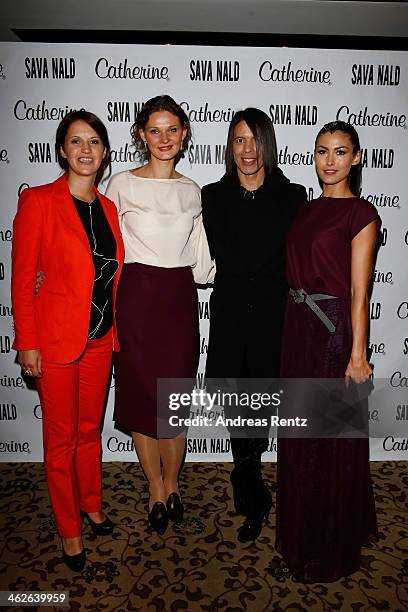 Guest, designer Inna Thomas, Jorge Gonzalez and Fiona Erdmann pose at the Sava Nald show during the Mercedes-Benz Fashion Week Autumn/Winter 2014/15...