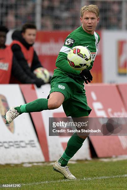 Kevin Schoeneberg of Muenster controls the ball during the 3. Liga match between Preussen Muenster and Dynamo Dresden at Preussenstadion on February...