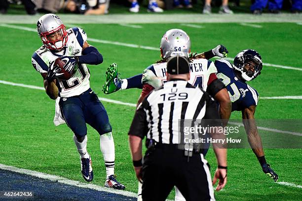 Malcolm Butler of the New England Patriots makes an interception against the Seattle Seahawks in the fourth quarter during Super Bowl XLIX at...