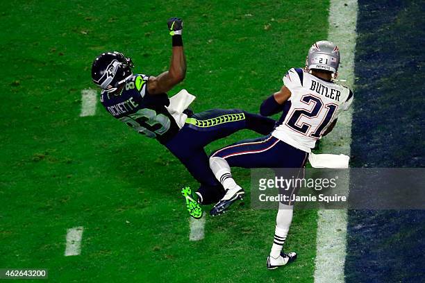 Malcolm Butler of the New England Patriots intercepts a pass by Russell Wilson of the Seattle Seahawks intended for Ricardo Lockette late in the...