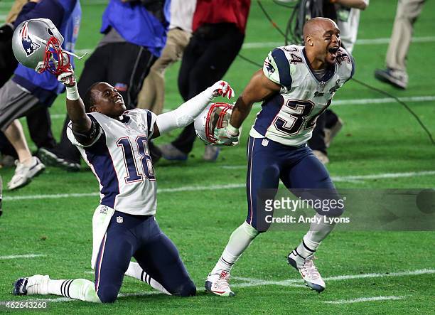 Matthew Slater and Shane Vereen of the New England Patriots celebrate after defeating the Seattle Seahawks during Super Bowl XLIX at University of...
