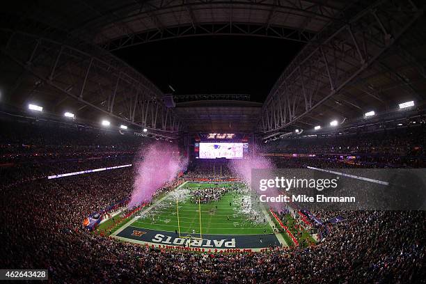 Confetti flies as the New England Patriots defeat the Seattle Seahawks during Super Bowl XLIX at University of Phoenix Stadium on February 1, 2015 in...