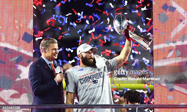 Julian Edelman of the New England Patriots celebrates with the Vince Lombardi Trophy after defeating the Seattle Seahawks 28-24 to win Super Bowl...