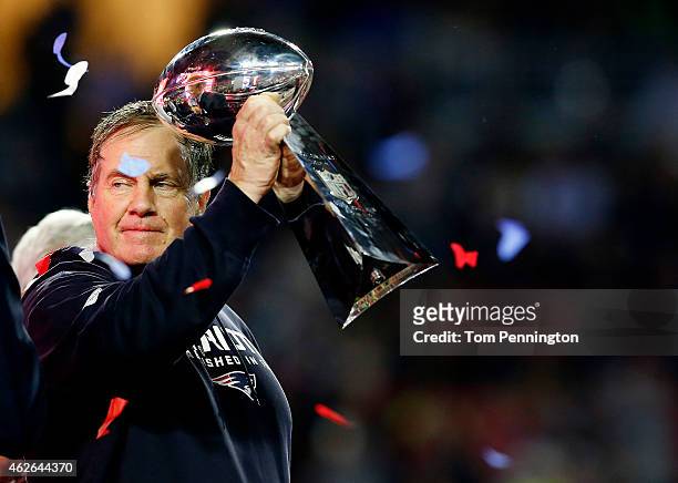 Head coach Bill Belichick of the New England Patriots holds the Vince Lombardi Trophyafter defeating the Seattle Seahawks 28-24 during Super Bowl...